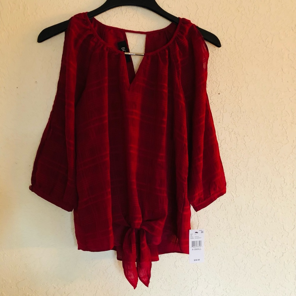 NWT BCX Woman’s Top. Cranberry Red. Size XS.